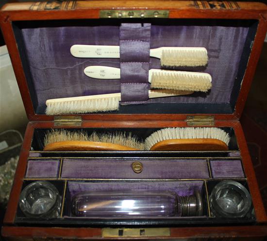 Victorian inlaid vanity box including toothbrush, brushes, etc